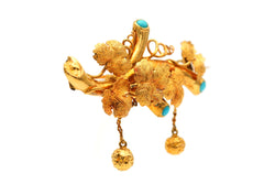 Broche Épingle en or jaune et turquoises