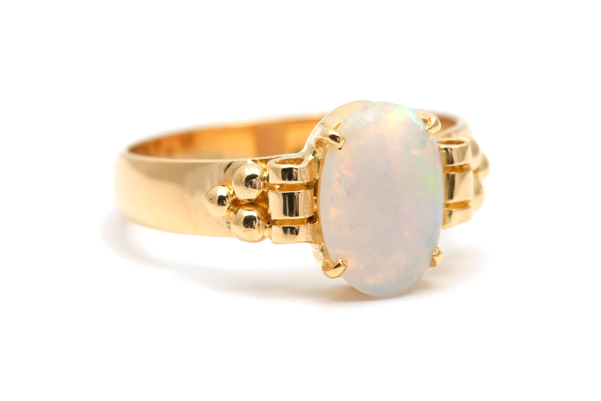 Bague Solitaire en or jaune et opale
