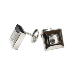 Boucles d'oreilles Puces CHOPARD "Happy Diamonds" en or blanc et diamants