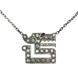 Collier Pendentif CARTIER "Baiser du Dragon" en or blanc, rubis et diamants