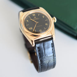 Montre ROLEX "Oyster Perpetual Bubbleback Ovetto" en or jaune et cuir
