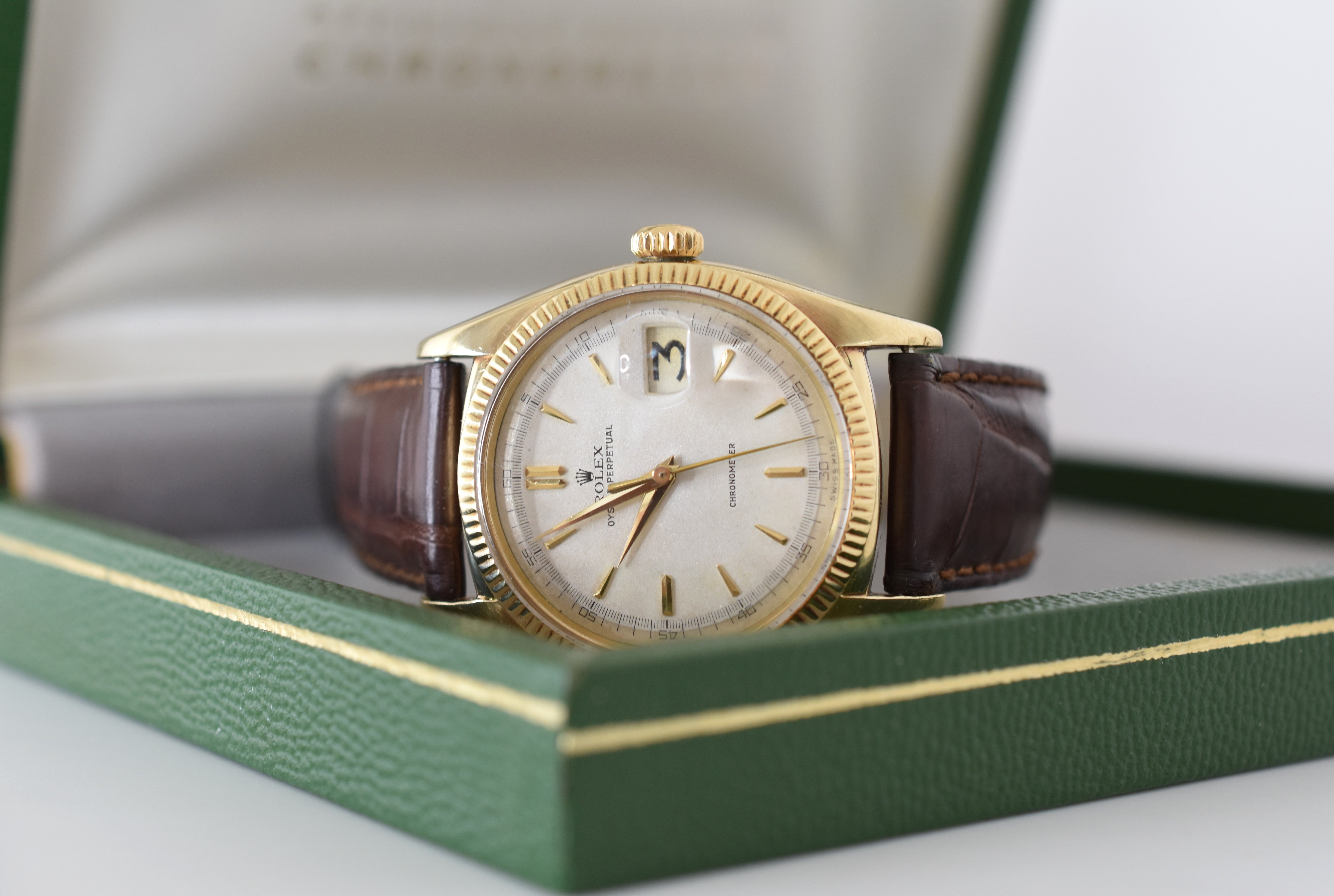 Montre ROLEX "Oyster Perpetual Date Ovettone" en or jaune et cuir