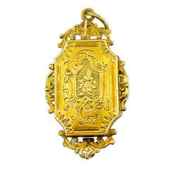 Médaillon en or jaune, perles et émeraudes