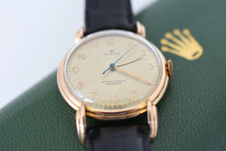Montre ROLEX "Chronomètre" en or rose, acier et cuir