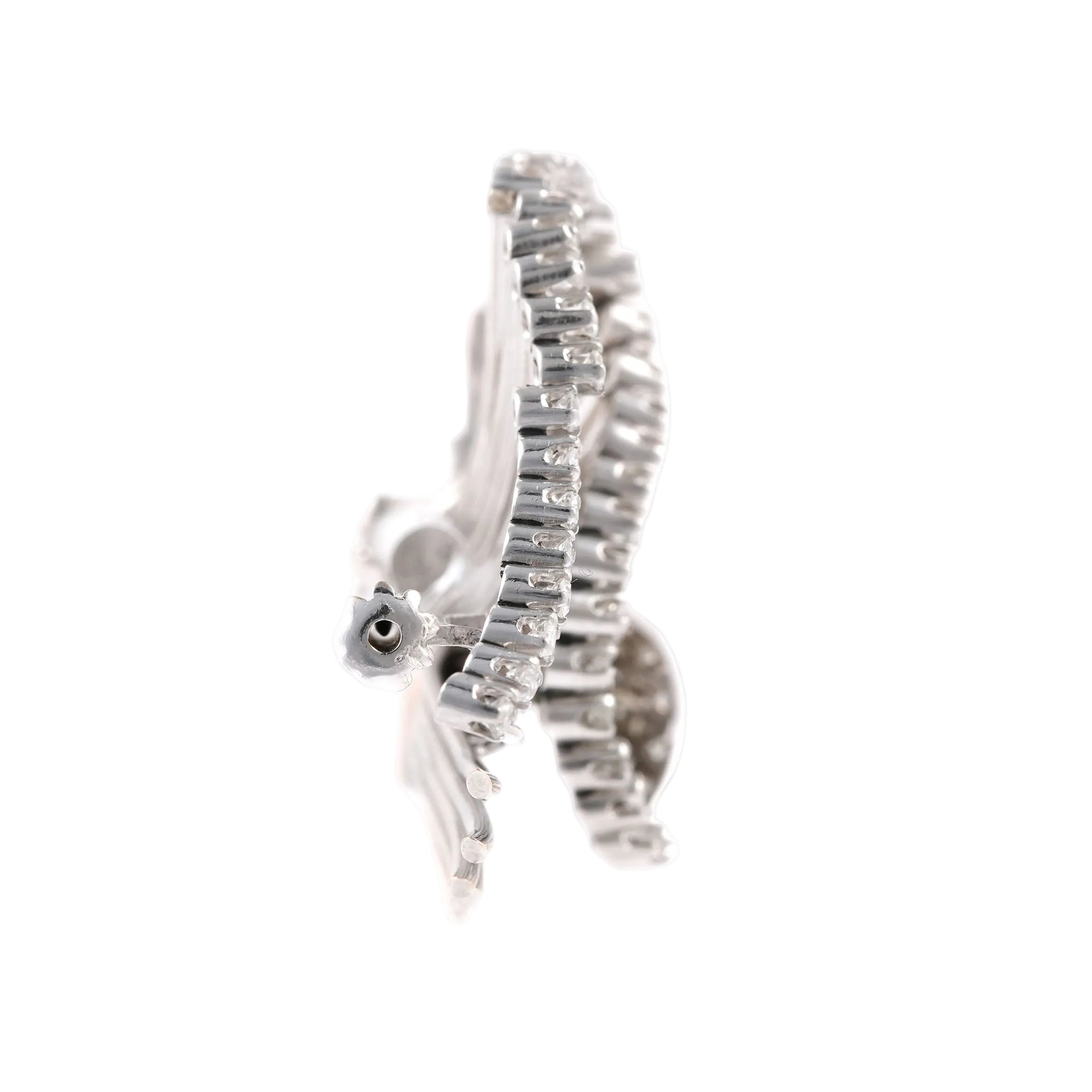 Broche en or blanc et diamants