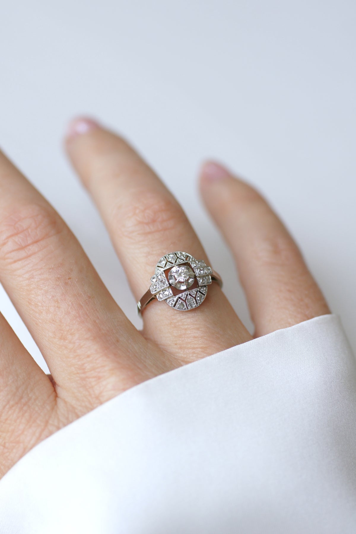 Bague Entourage en or blanc, platine et diamants