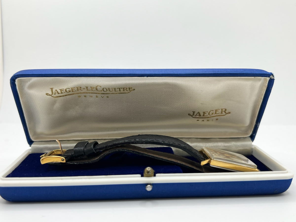 Montre JAEGER-LECOULTRE "Vintage Carrée" plaqué or, argent, acier et cuir