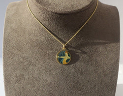 CARTIER - Pendentif Sagittaire Email plique à jour Or - Castafiore