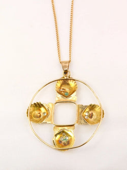 Cartier pour Shell, Pendentif vintage rond en or, diamants et émeraudes - Castafiore