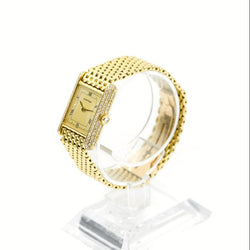Montre CARTIER Tank Louis M en or jaune et diamants