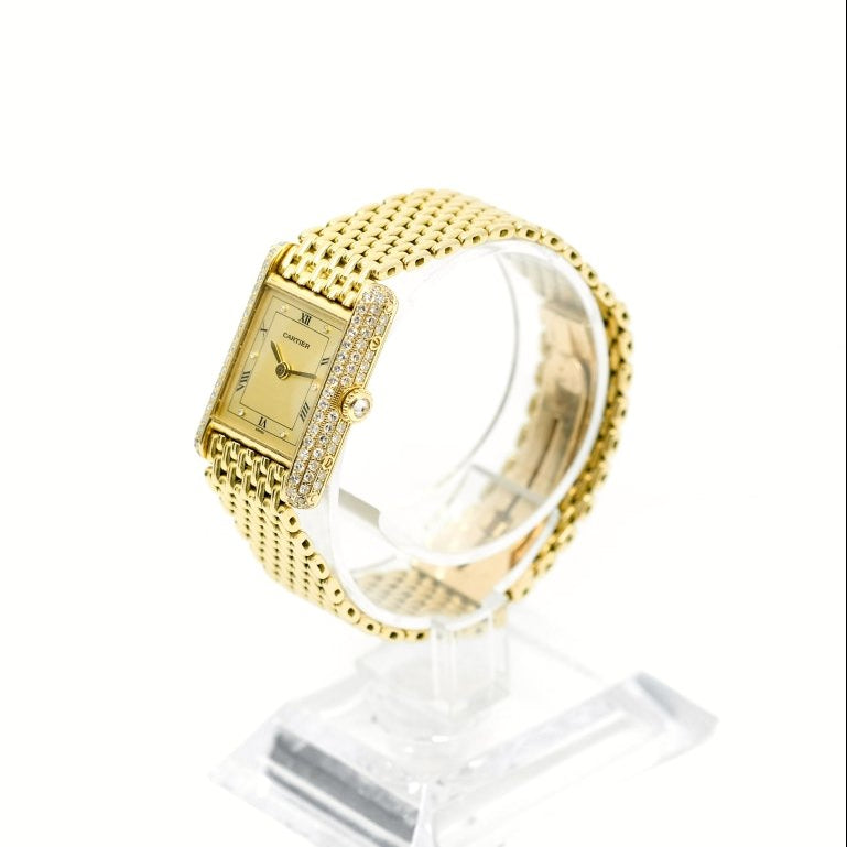 Montre CARTIER Tank Louis M en or jaune et diamants