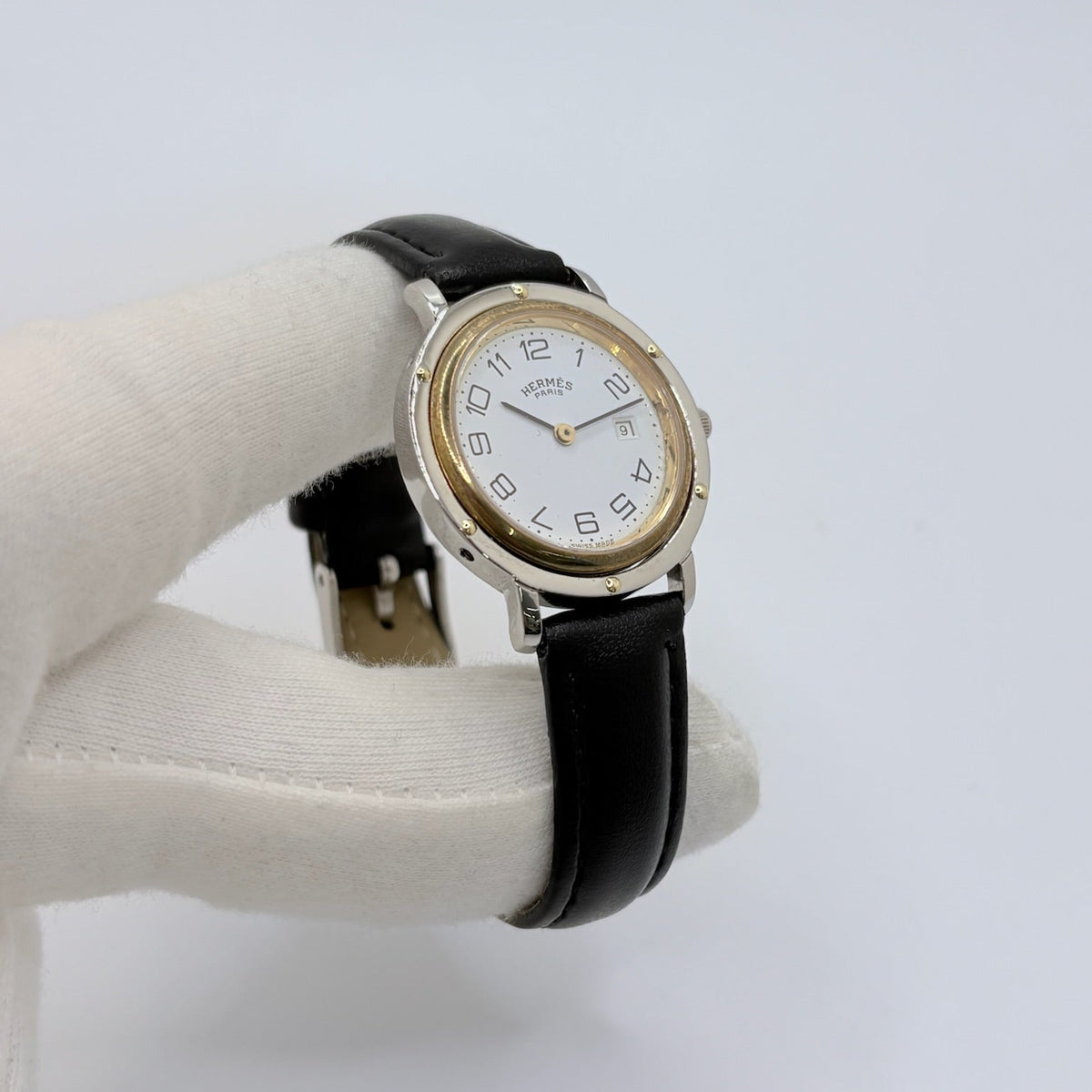 Montre HERMÈS "Clipper" en or jaune, acier et cuir