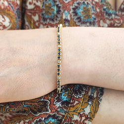 Bracelet Ligne en or jaune, saphirs et diamants