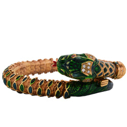 Bracelet en or jaune, émail, rubis et diamants