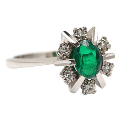 Bague Entourage en or blanc, émeraude et diamants