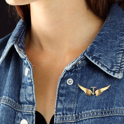 Broche en or jaune, argent et diamants