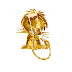 Clip VAN CLEEF & ARPELS, "Lion Ebouriffé" en or jaune, émeraude et diamants - Castafiore