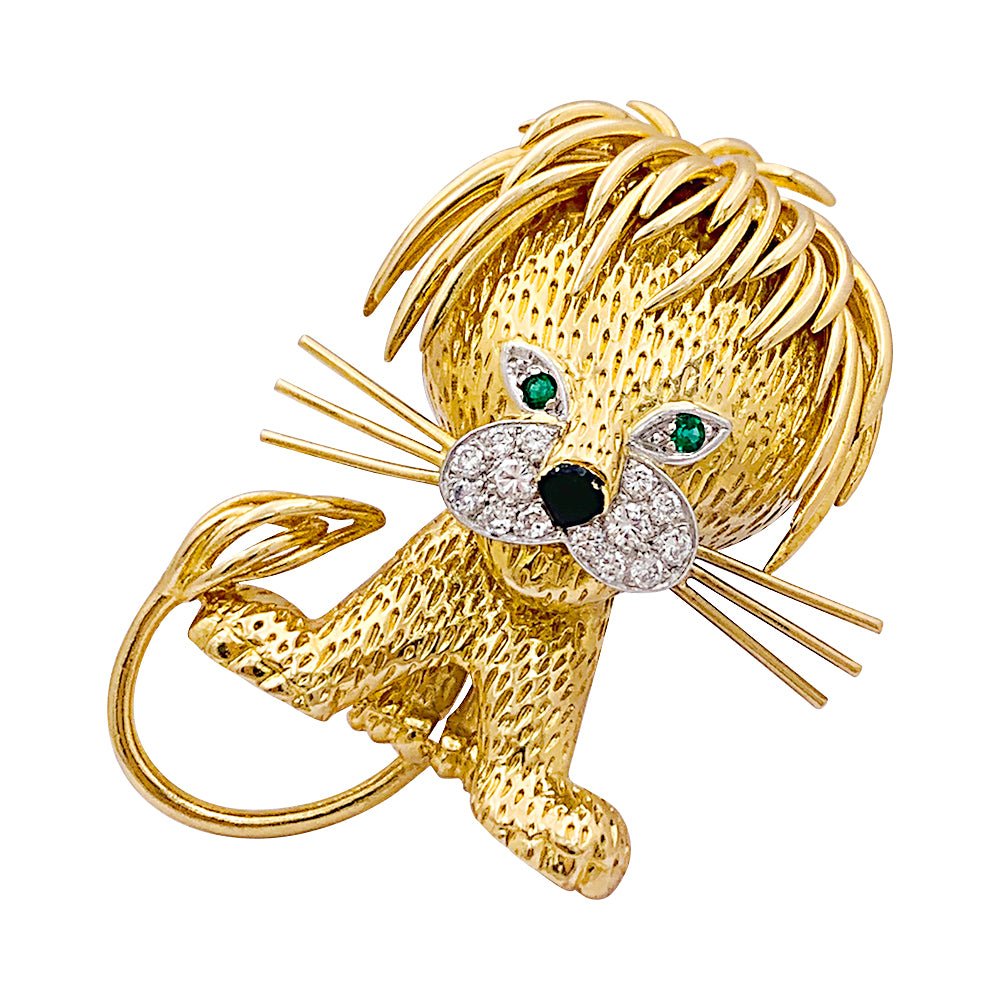 Clip VAN CLEEF & ARPELS "Lion Ebouriffé" en or jaune, platine, émeraudes et diamants - Castafiore