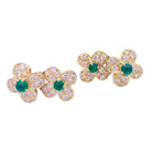 Clips Van Cleef & Arpels, "Fleurette", en or jaune, diamants et émeraudes. - Castafiore