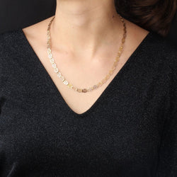 Collier ancien en or rose à motifs ajourés et articulés - Castafiore