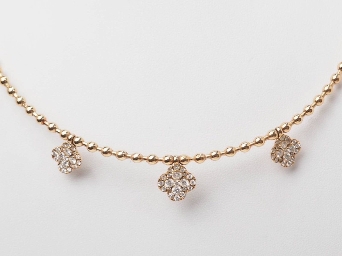 Collier boules rigide et trèfles en or rose et diamants - Castafiore