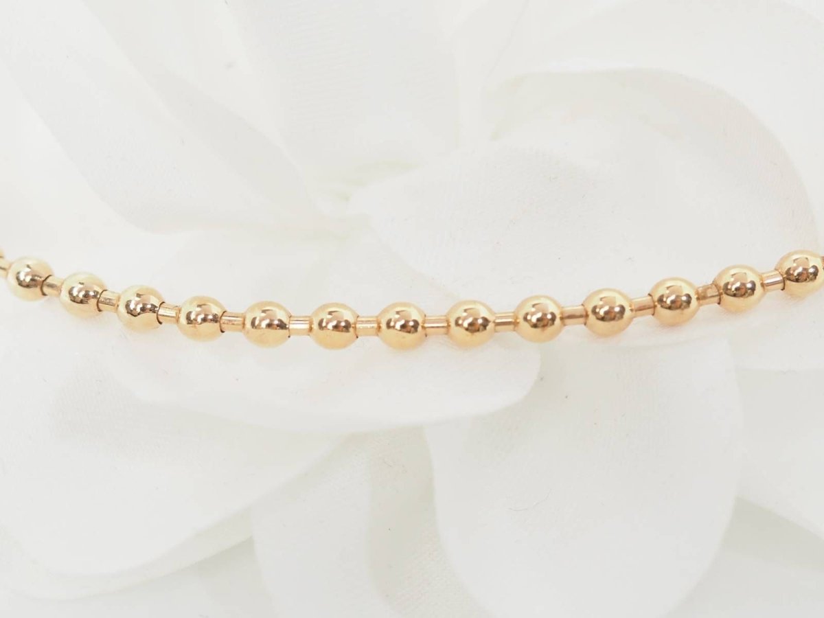 Collier boules rigide et trèfles en or rose et diamants - Castafiore