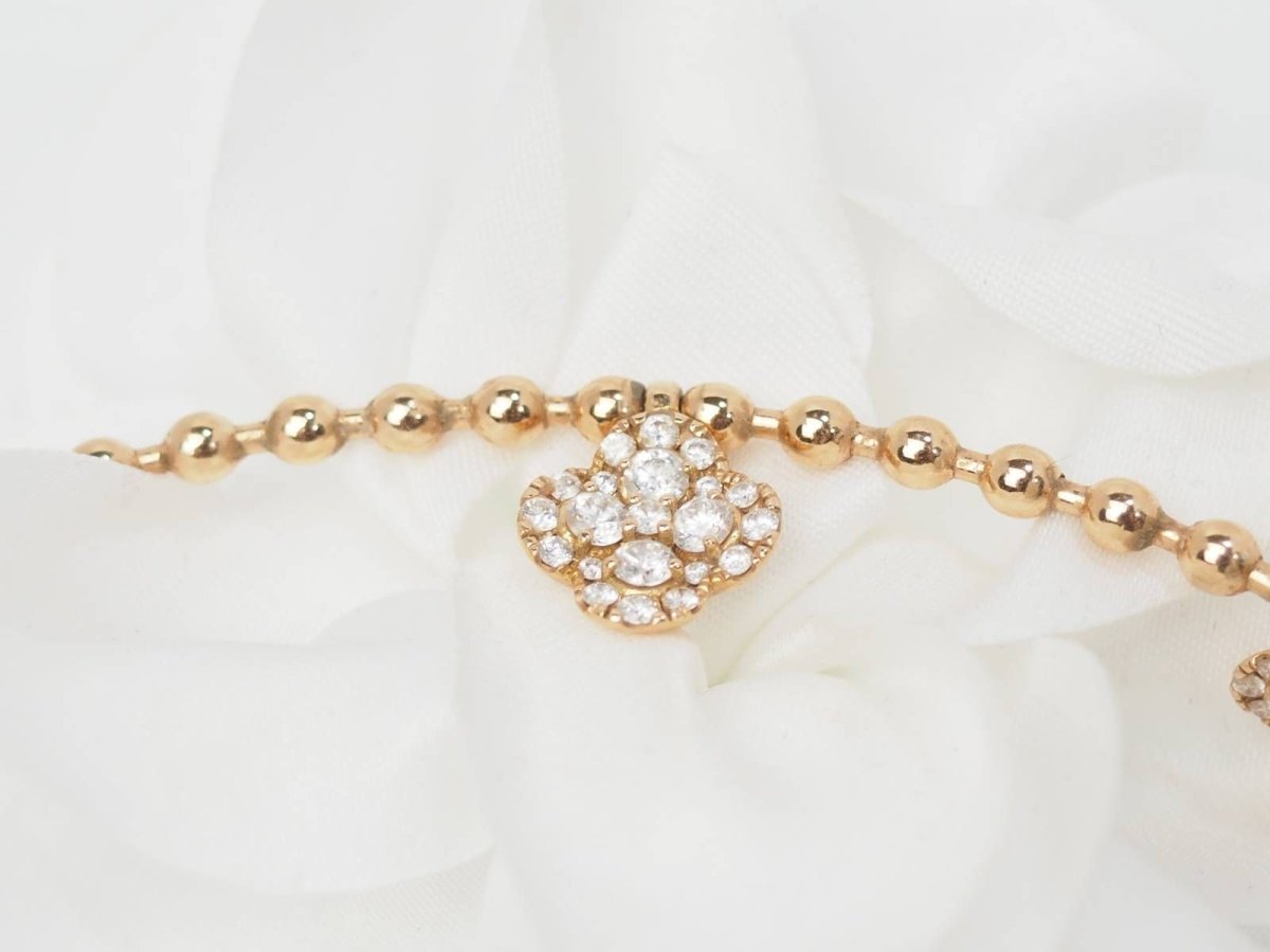 Collier boules rigide et trèfles en or rose et diamants - Castafiore