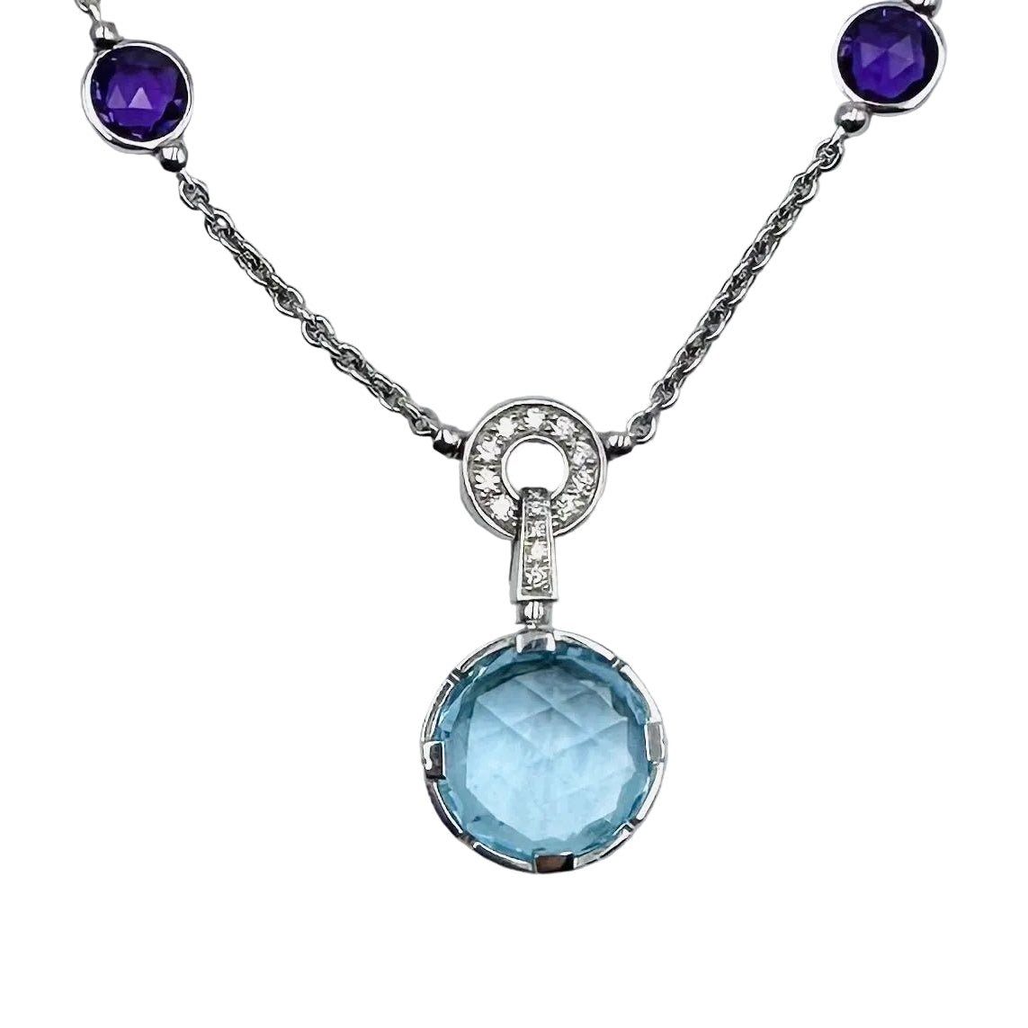 Collier BVLGARI "Parentesi Cocktail" en or blanc, topazes bleues, améthystes et diamants - Castafiore