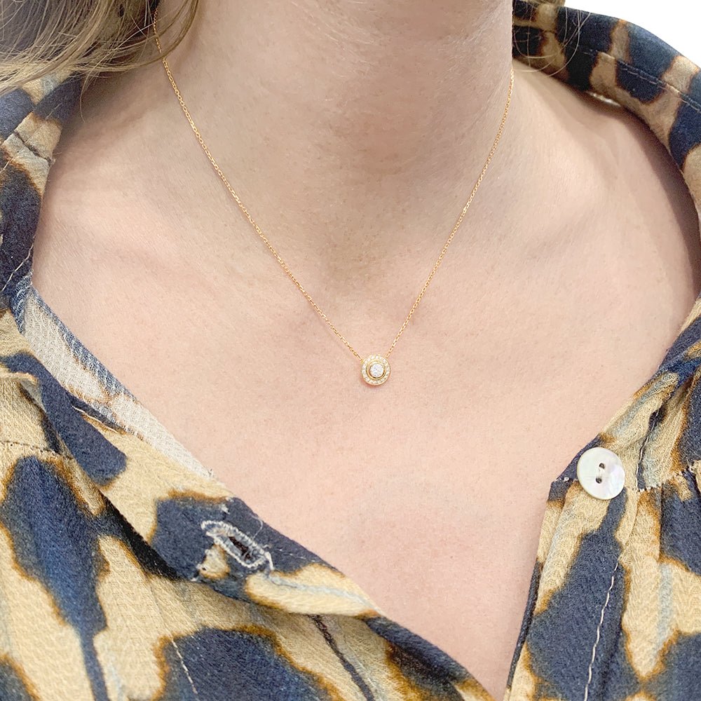 Collier CARTIER "Cartier d'Amour" en or rose et diamants. - Castafiore
