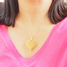 Collier CARTIER "Coeur" en or jaune - Castafiore