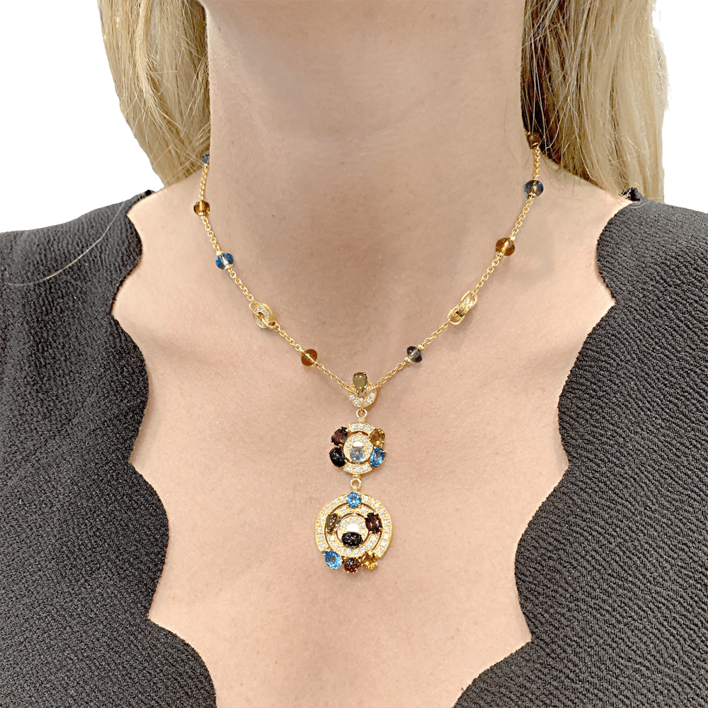 Collier Chaîne BULGARI "Astrale" en or jaune, topazes, citrines, péridots, rhodolites, tourmalines et diamants - Castafiore
