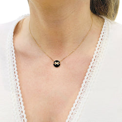 Collier Chaumet ,"Jeux de Liens", or rose, diamants et onyx. - Castafiore