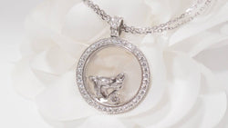 Collier Chopard "happy Diamonds" en or blanc et diamants - Castafiore