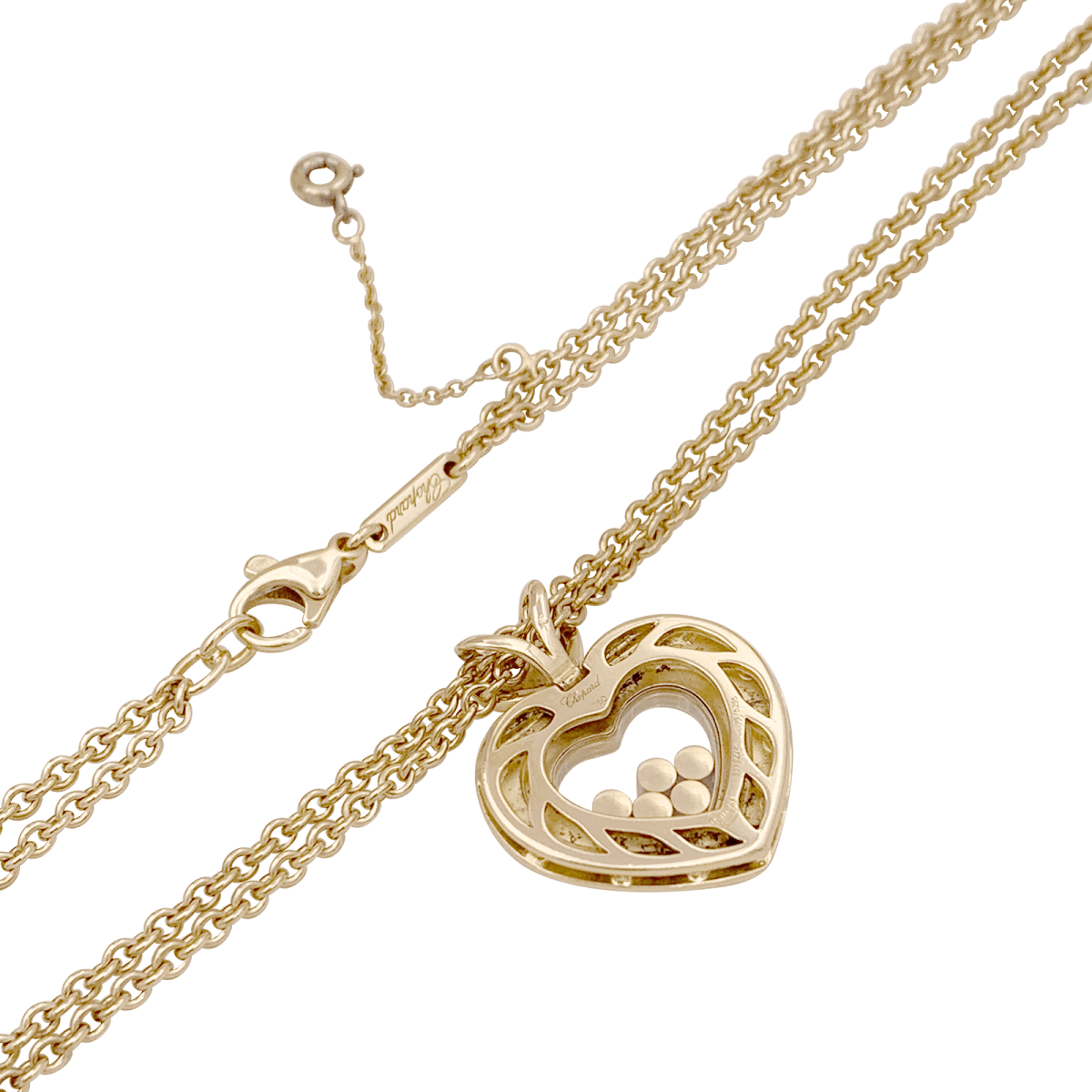 Collier CHOPARD "Happy Diamonds" en or jaune et diamants - Castafiore