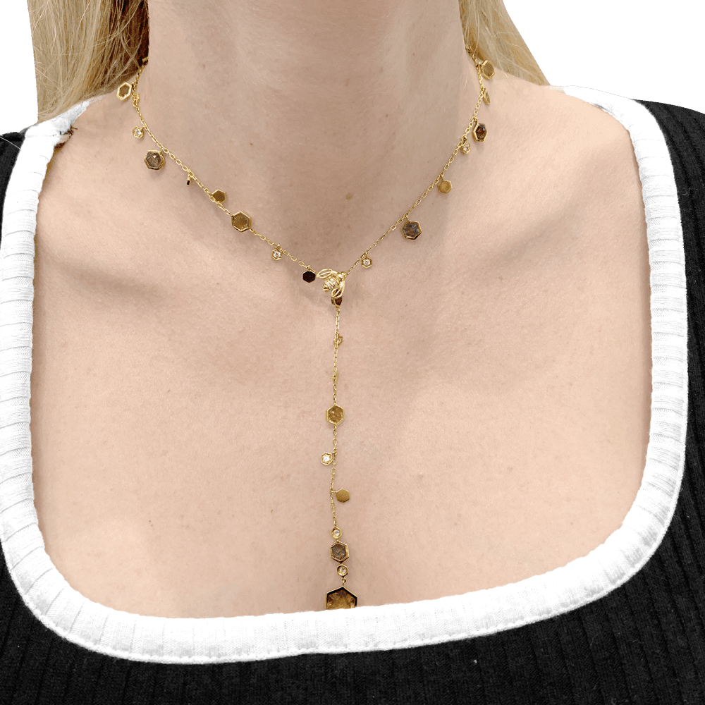 Collier Cravate PIAGET "Magic Garden Limelight" en or jaune, améthystes, citrines, grenats et diamants - Castafiore