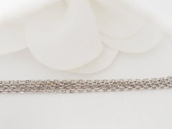 collier croix vintage en or blanc et diamants - Castafiore