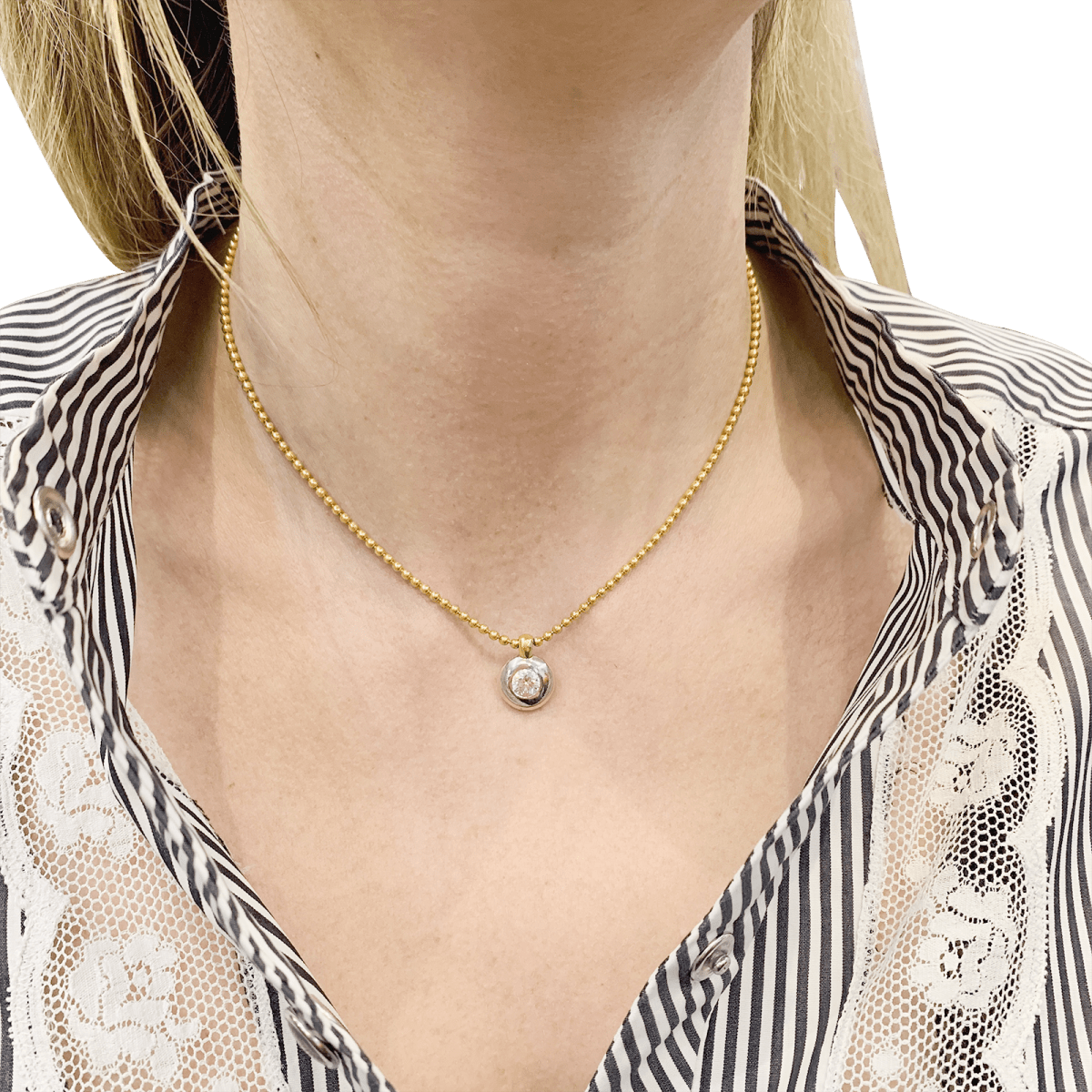 Collier deux ors, diamant. - Castafiore