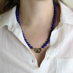Collier DINH VAN "Menottes R15" en or jaune et lapis lazuli - Castafiore