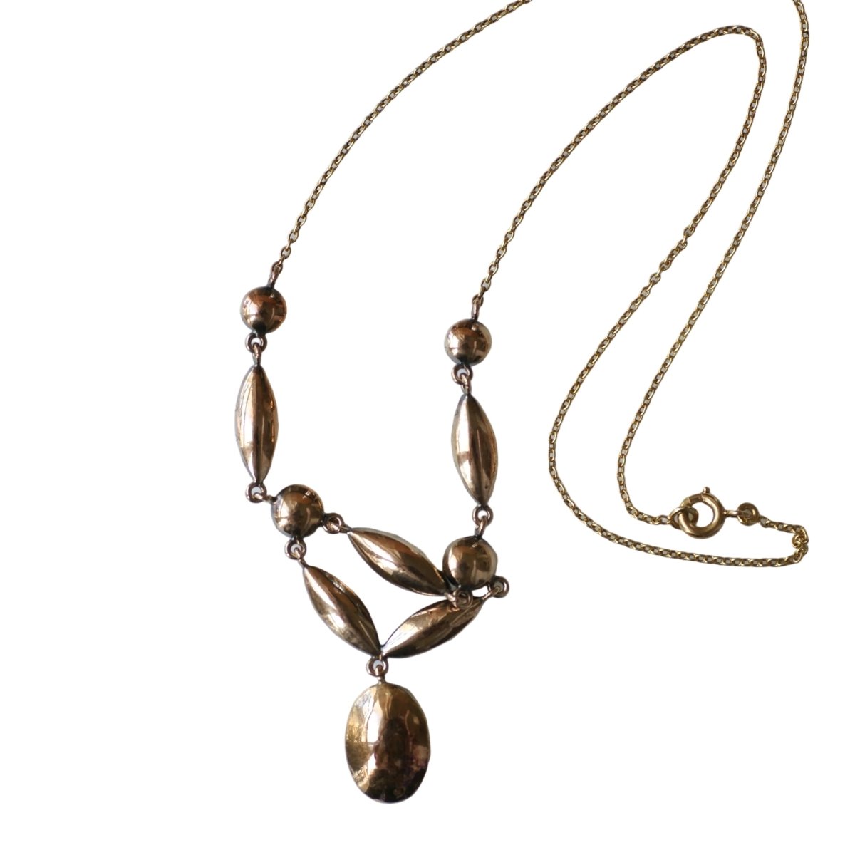 Collier Draperie en or jaune, or rose et grenats - Castafiore