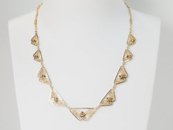 Collier draperie Fin XIXème en or jaune - Castafiore