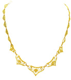 Collier en or 18 carats à décor de filigranes et feuilles, époque 1900 - Castafiore