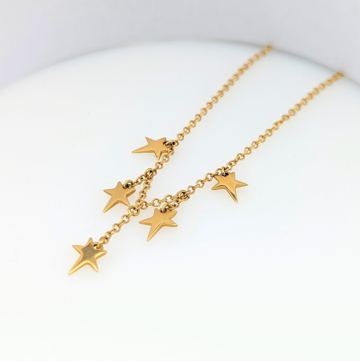 Collier en or jaune à pampilles étoiles - Castafiore