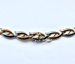 Collier et bracelet en or jaune et blanc 18 carats formant parure - Castafiore