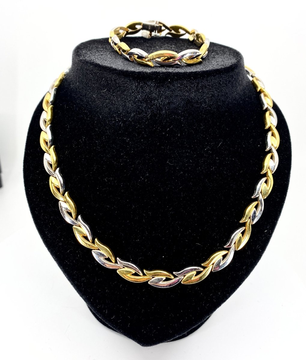 Collier et bracelet en or jaune et blanc 18 carats formant parure - Castafiore