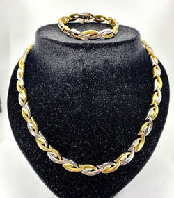 Collier et bracelet en or jaune et blanc 18 carats formant parure - Castafiore