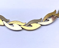 Collier et bracelet en or jaune et blanc 18 carats formant parure - Castafiore