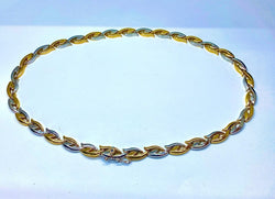 Collier et bracelet en or jaune et blanc 18 carats formant parure - Castafiore