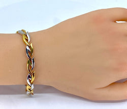 Collier et son bracelet en or blanc et jaune 18 carats formant parure. - Castafiore