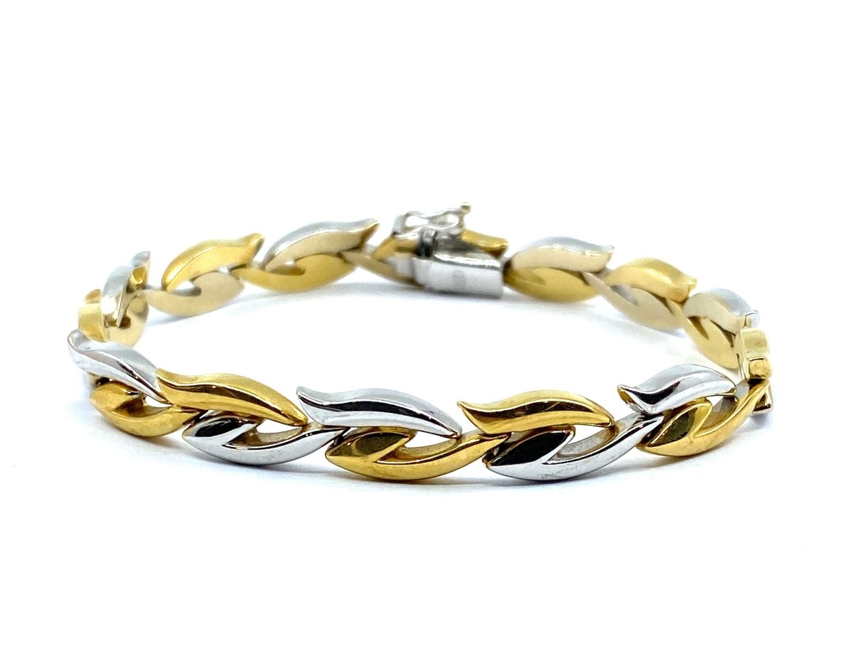 Collier et son bracelet en or blanc et jaune 18 carats formant parure. - Castafiore