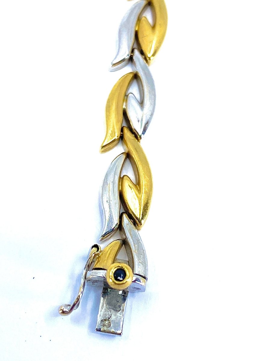 Collier et son bracelet en or blanc et jaune 18 carats formant parure. - Castafiore